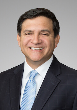 Mark E. Macias